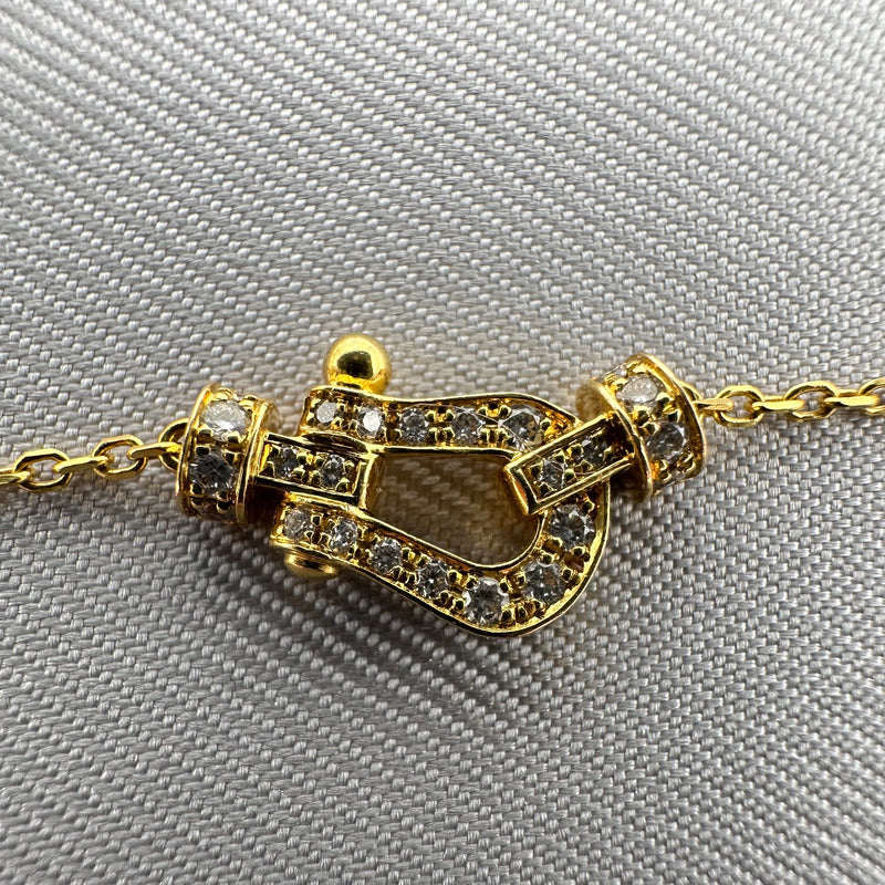 Collier Force 10 or jaune